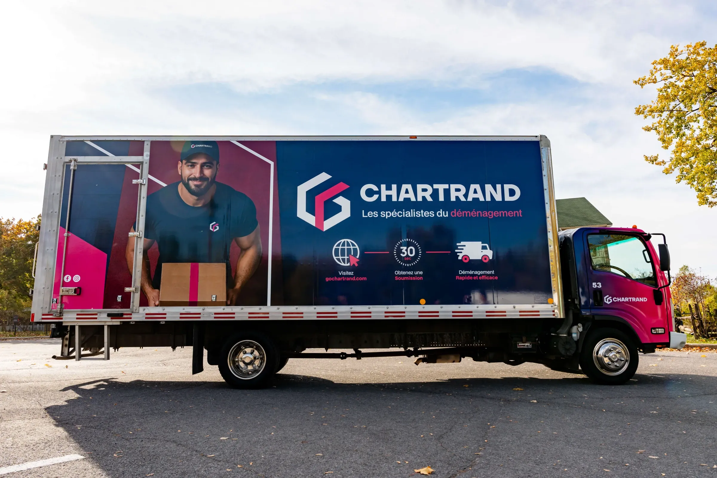 Chartrand moving truck parked, side view